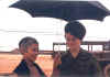 teo_and_martha_with_umbrella_-1971.jpg (125264 bytes)